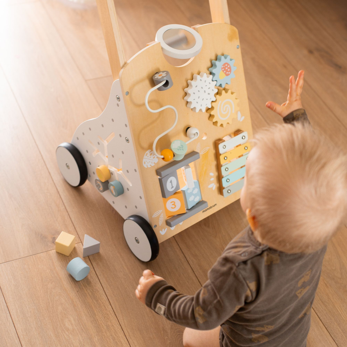 Pädagogische Lauflernhilfe 8in1 / Babystoßer - Manipulationsbrett