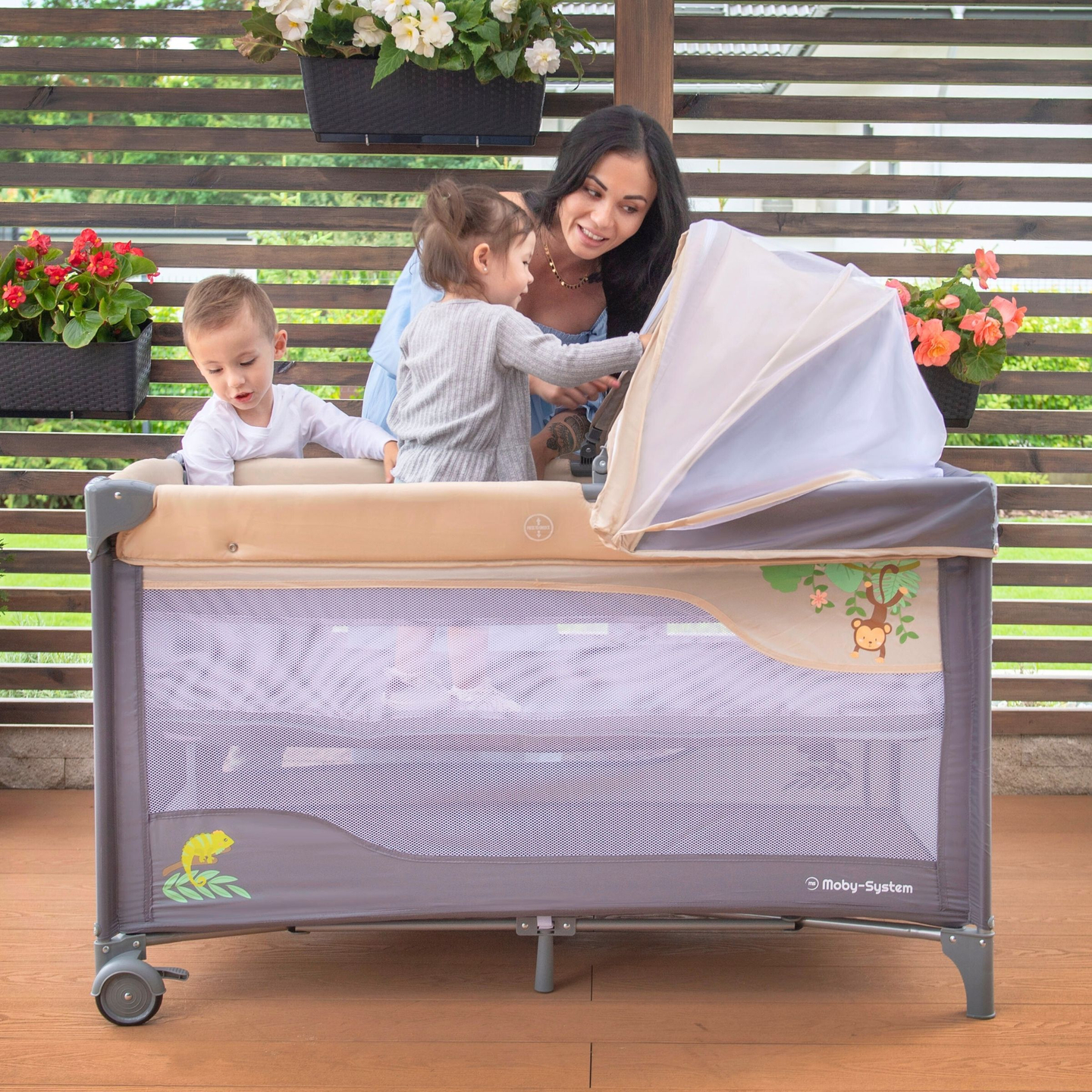 Reisebett 0 - 36 m mit Wickeltisch + Moby-System HUXLEY Laufgitter