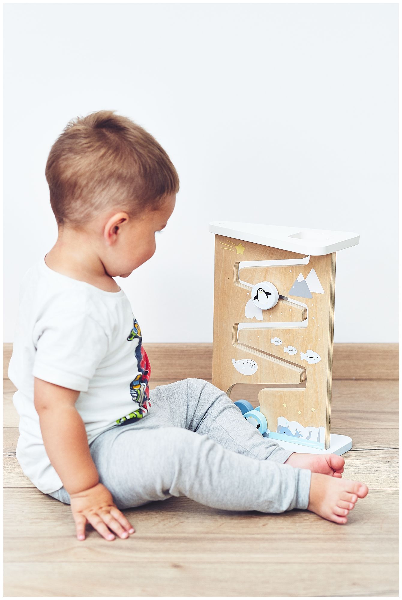 Zweiseitige sensorische Manipulationstafel aus Holz