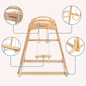 Indoor-Spielplatz aus Holz mit Schaukel, Turnringen und Kletternetz