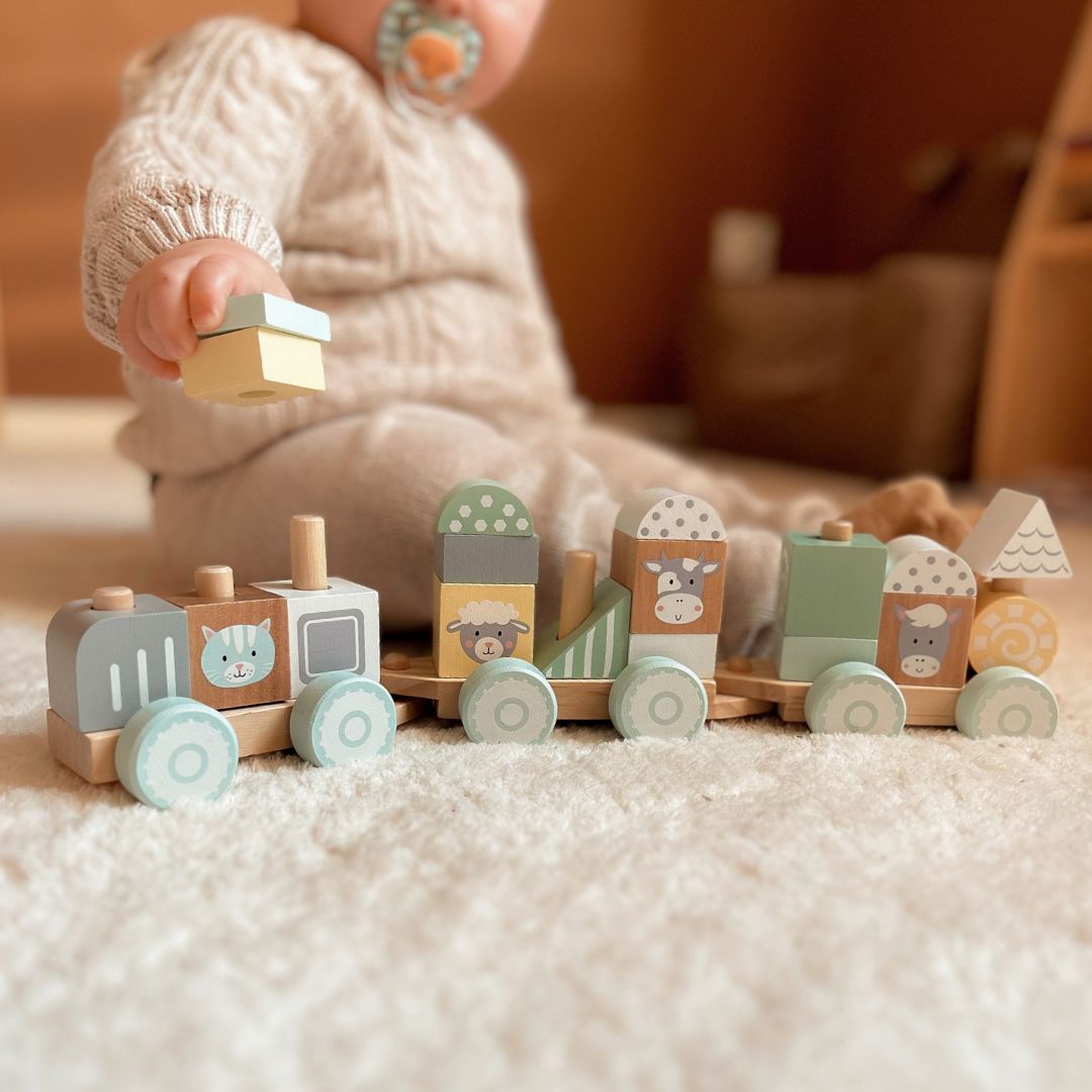 Holzeisenbahn mit Blöcken für einen Jungen - Bauernhof